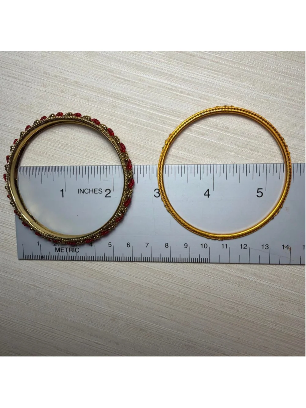 Red and gold children's bangles set with rhinestones